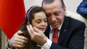 Turkish President Tayyip Erdogan meets with Syrian girl Bana Alabed, known as Aleppo's tweeting girl, at the Presidential Palace in Ankara, Turkey, December 21, 2016. Kayhan Ozer/Presidential Palace/Handout via REUTERS ATTENTION EDITORS - THIS PICTURE WAS PROVIDED BY A THIRD PARTY. FOR EDITORIAL USE ONLY. NO RESALES. NO ARCHIVE.     TPX IMAGES OF THE DAY